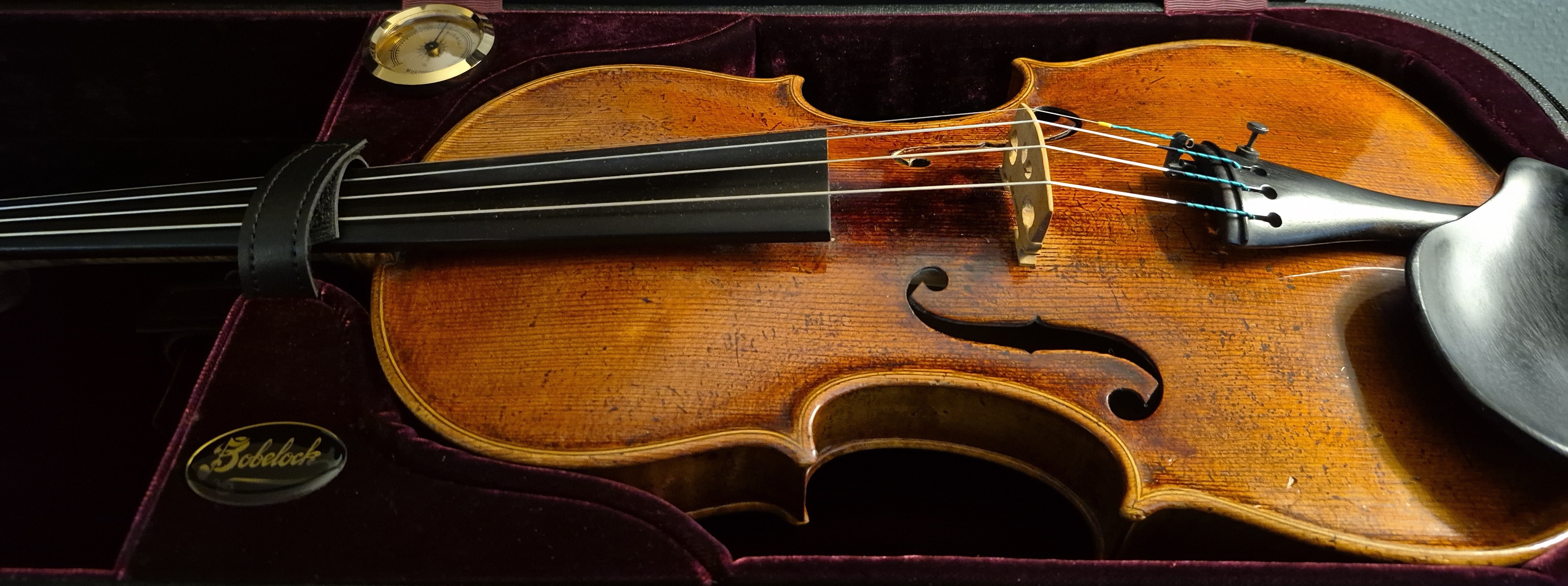 Close-up of two violins showing their craftsmanship